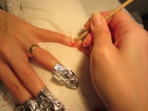 color street nail removal via wooden stick